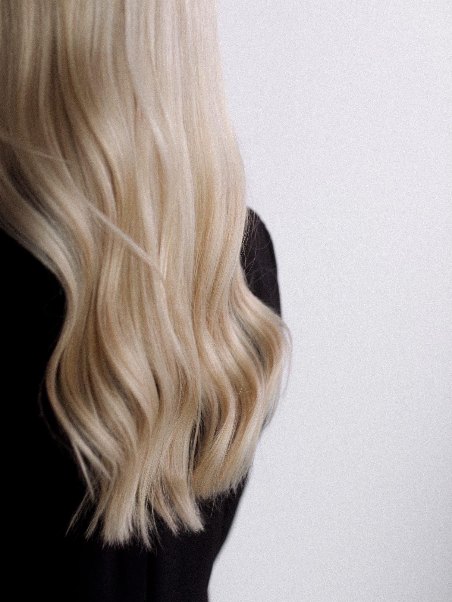 Soft blonde waves, color by Studio 91